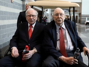 Berkshire Hathaway chairman Warren Buffett (left) and vice-chairman Charlie Munger are seen at the annual Berkshire shareholder shopping day in Omaha, Nebraska, May 3, 2019.