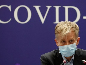 Bruce Aylward of the World Health Organisation (WHO) attends a news conference of the WHO-China Joint Mission on COVID-19 about its investigation of the coronavirus outbreak in Beijing, China, Feb. 24, 2020.