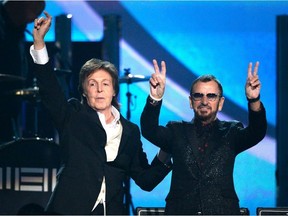 Musicians Paul McCartney (L) and Ringo Starr of The Beatles perform onstage during the 56th GRAMMY Awards at Staples Center on January 26, 2014 in Los Angeles, California.