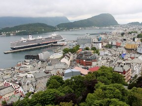 Holland America's newest ship, ms Koningsdam, docked in pretty port city of Alesund, Norway.
