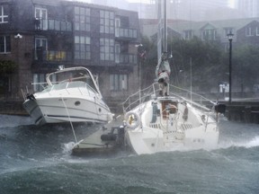 Boats take a beating along the waterfront in Halifax as hurricane Dorian approaches on Saturday, Sept. 7, 2019.