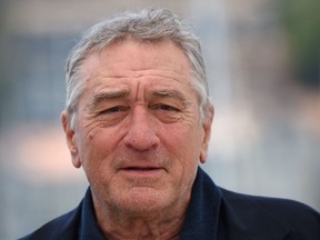 In this file photo taken on May 16, 2016 US actor Robert de Niro poses during a photocall for the film "Hands of Stone" at the 69th Cannes Film Festival in Cannes, southern France.