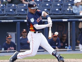 Alex Bregman of the Houston Astros hits against the Miami Marlins during a spring training game at The Fitteam Ballpark of the Palm Beaches on March 14, 2019 in West Palm Beach, Florida.