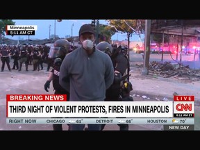 CNN reporter Omar Jimenez and his camera crew were arrested live on air while covering the protests in Minneapolis on Friday, May 29, 2020. They were released from custody about an hour later.