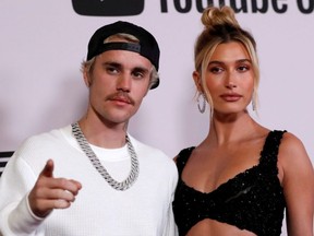 Singer Justin Bieber and his wife Hailey Baldwin pose at the premiere for the documentary television series "Justin Bieber: Seasons" in Los Angeles, Jan. 27, 2020.