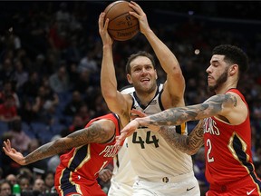 Bojan Bogdanovic of the Utah Jazz shoots the ball over Lonzo Ball of the New Orleans Pelicans at Smoothie King Center on Jan. 16, 2020, in New Orleans.