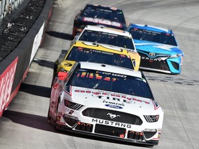 Brad Keselowski leads a pack of cars during the NASCAR Cup Series Food City presents the Supermarket Heroes 500 at Bristol Motor Speedway on May 31, 2020 in Bristol, Tennessee.