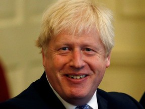 British Prime Minister Boris Johnson attends a roundtable at Downing Street in London, Britain, September 19, 2019.