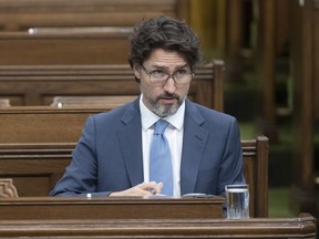 Prime Minister Justin Trudeau waits for a session of the Special Committee on the COVID-19 Pandemic to begin in the Chamber of the House of Commons in Ottawa, Wednesday, May 13, 2020.