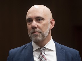 Parliamentary Budget Officer Yves Giroux waits to appear before the Commons Finance committee on Parliament Hill in Ottawa on March 10, 2020.