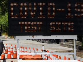 A patient walks-in at a Covid-19 testing site on May 12, 2020 in Arlington, Virginia.