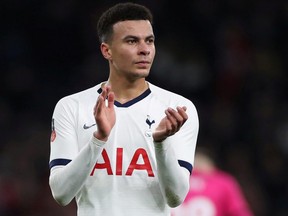 Tottenham Hotspur's Dele Alli applauds fans after a match against Southampton on February 5, 2020.