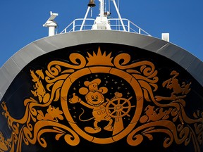 Cartoon character Mickey Mouse is seen on the bow of the Disney Wonder cruise ship as its docks in San Diego, Calif., beginning the local 2014-15 cruising season in the city Sept. 12, 2014.