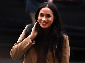 Britain's Meghan, Duchess of Sussex reacts as she arrives to visit Canada House, in London, on Jan. 7, 2020.