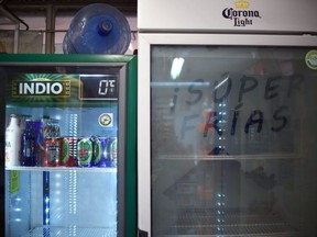 View of empty fridges following the shortage of beer, after the breweries countrywide closed their production due to COVID-19, at a grocery store in Mexico City on May 5, 2020.