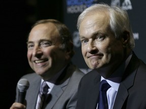 Don Fehr (front), head of the NHL Players Association, and NHL commissioner Gary Bettman have been speaking by phone almost daily during the coronavirus pandemic.