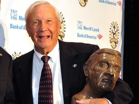 Pat Dye poses with his busts after an induction ceremony at the Georgia-Florida Hall of Fame on Oct. 31, 2014, in Jacksonville, Fla.