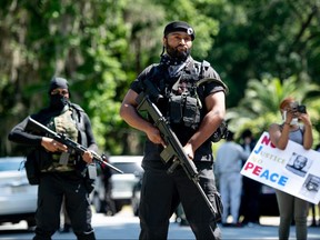 Members of the Black Panther Party, "I Fight For My People", and "My Vote is Hip Hop" demonstrate in the Satilla Shores neighborhood on May 9, 2020 where Ahmaud Arbery was shot and killed in Brunswick, Georgia.