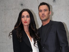 Megan Fox and Brian Austin Green pose as they arrive for the Emporio Armani spring-summer 2011 ready-to-wear collection on Sept. 25, 2010 during the Women's fashion week in Milan.