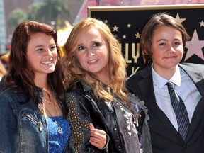 This photo taken on Sept. 27, 2011 shows singer Melissa Etheridge, centre, posing with her son Beckett, right, and her daughter Bailey during her Walk of Fame ceremony held at the Hard Rock cafe in Hollywood.