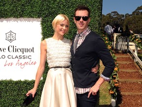 Actress Jaime King (R) and Producer/Director Kyle Newman arrive at the Veuve Clicquot Polo Classic Los Angeles at Will Rogers State Historic Park on October 9, 2011 in Los Angeles, California.
