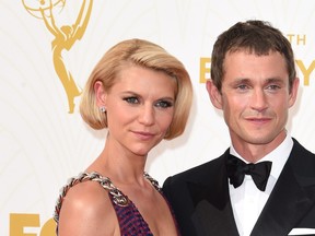 Actors Claire Danes, left, and Hugh Dancy attend the 67th Emmy Awards, Sept. 20, 2015 at the Microsoft Theatre in downtown Los Angeles.