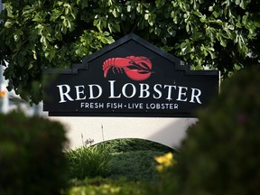 A sign is posted in front of a Red Lobster restaurant on May 16, 2014 in San Bruno, California.