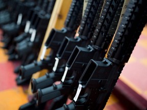 This file photo taken on November 5, 2016 shows rifles for sale at a gun shop in Merrimack, New Hampshire.

Stock: guns