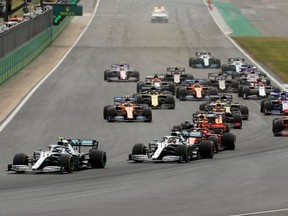 Mercedes' Valtteri Bottas leads Mercedes' Lewis Hamilton at the first corner of the race