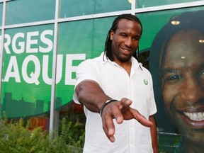 Green Party of Canada deputy leader and Bourassa by-election candidate Georges Laraque smiles following the opening of his new campaign office in the riding of Bourassa in Montreal August 15, 2013.