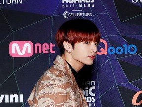Jungkook, member of South Korean boy band BTS, arrives at the red carpet event during the annual MAMA Awards at Nagoya Dome in Nagoya, Japan, December 4, 2019.