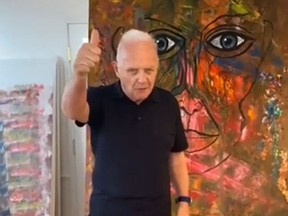Anthony Hopkins gives a thumbs up in a video posted on social media that shows him doing Drake’s viral Toosie Slide dance challenge.