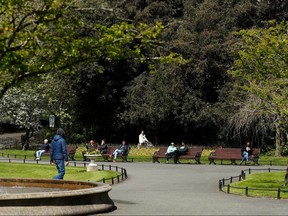 People are seen in St Stephen’s Green following the outbreak of the coronavirus in Dublin, Ireland, May 1, 2020.