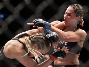 Katlyn Chookagian (left) fights Jessica Eye in a flyweight bout during UFC 231 at Scotiabank Arena in Toronto, Dec. 8, 2018.