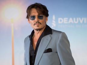 Johnny Depp poses during a photocall to present the movie 'Waiting for the Barbarians' during the 45th Deauville U.S. Film Festival, in Deauville, France, on Sept. 8, 2019.
