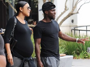 Kevin Hart and pregnant wife Eniko Hart seem to be on good terms as the couple leaves Joey's Restaurant in Woodland Hills.