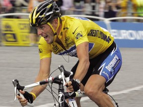 Lance Armstrong rides during the 21st stage of the Tour de France in Paris, 24 July 2005.