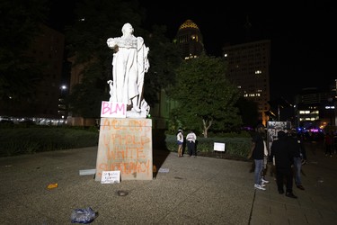 A vandalized statue of Louis XVI stands in downtown as protests dwindle on May 29, 2020 in Louisville, Kentucky.