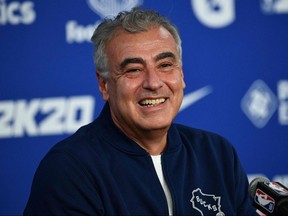 In this file photo taken on January 24, 2020, Marc Lasry, co-owner of the Milwaukee Bucks, addresses a press conference at The AccorHotels Arena in Paris.
