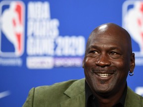 Former NBA star and owner of the Charlotte Hornets Michael Jordan looks on as he addresses a press conference at The AccorHotels Arena in Paris on January 24, 2020.