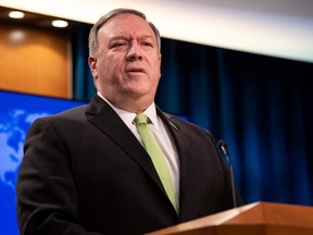 U.S. Secretary of State Mike Pompeo speaks to the media at the State Department in Washington, D.C., Wednesday, May 20, 2020.
