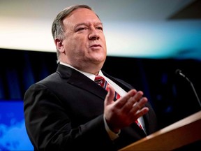 In this file photo U.S. Secretary of State Mike Pompeo pauses while speaking at a news conference at the State Department on April 29, 2020, in Washington.