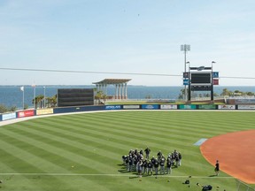 The Biloxi Shuckers practice at the Pensacola Blue Wahoos' stadium in Pensacola, Fla., Wednesday, April 8, 2015.