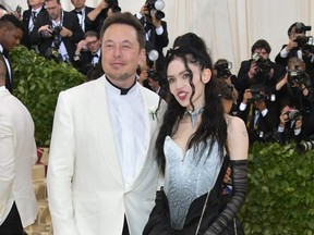 Elon Musk and Grimes attend the Heavenly Bodies: Fashion & The Catholic Imagination Costume Institute Gala at The Metropolitan Museum of Art in New York City on May 7, 2018.