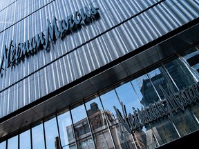 The signages outside the Neiman Marcus store are seen during the outbreak of the coronavirus disease (COVID-19) in New York City, April 19, 2020.