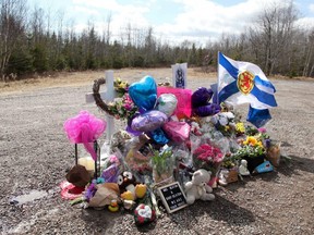 The makeshift memorial to Kristen Beaton, who was expecting her third child and was killed along Plains Road during Sunday’s mass shooting, is seen in Debert, Nova Scotia, April 23, 2020.