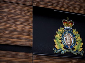 The RCMP logo is seen outside Royal Canadian Mounted Police "E" Division Headquarters, in Surrey, B.C., on Friday April 13, 2018.