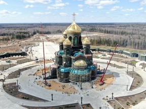 An aerial view shows a new Orthodox cathedral dedicated to the Russian Armed Forces during construction works outside Moscow April 28, 2020.
