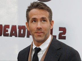 Ryan Reynolds poses on the red carpet during the premiere of "Deadpool 2" in Manhattan, May 14, 2018.