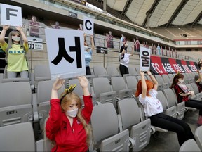 Mannequins are placed in seats to cheer South Korea's football club FC Seoul during a match against Gwangju FC in Seoul, South Korea, May 17, 2020.